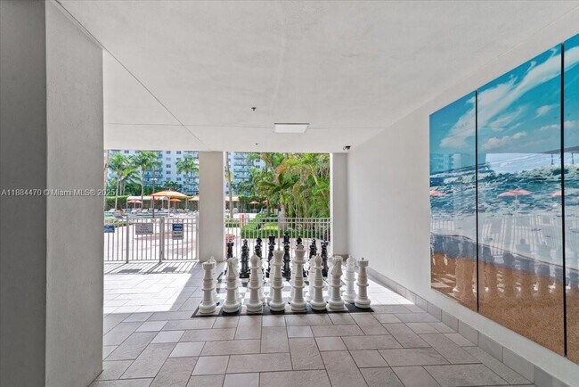 Building Photo - 19380 Collins Ave