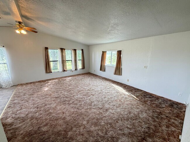 Building Photo - Secluded country home w/ 2-car garage