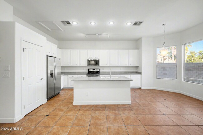 Building Photo - 7456 W Aurora Dr