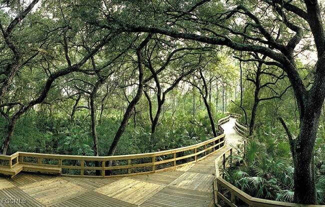 Building Photo - 10637 Pelican Preserve Blvd