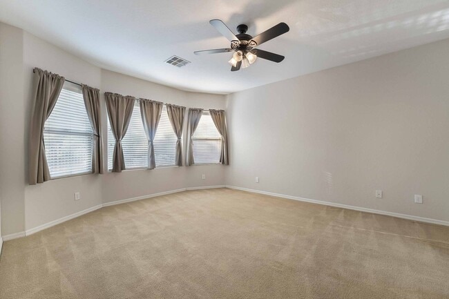 Building Photo - Tranquil Oasis: Golf Course Views!