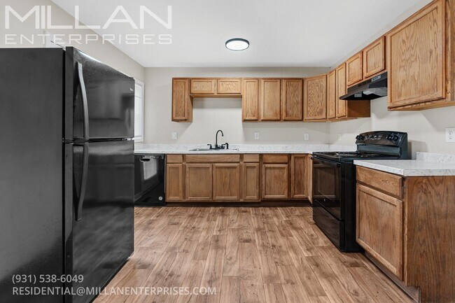 Building Photo - Charming Three Bedroom Home with Natural Privacy and Prime Location