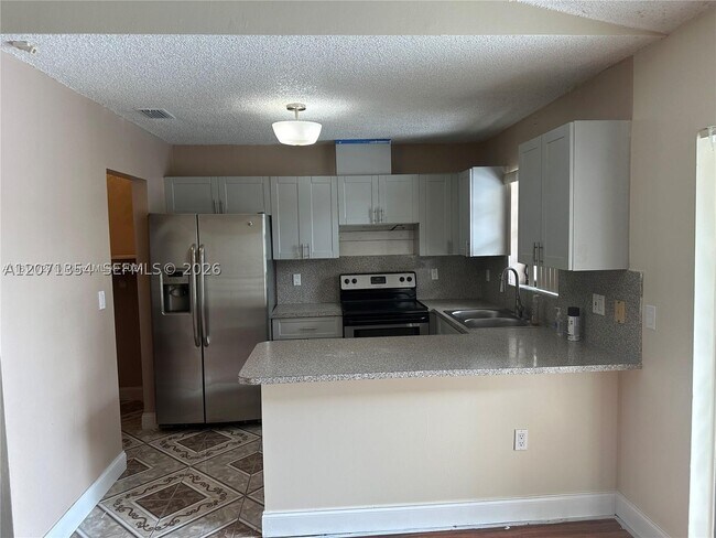 Building Photo - 6991 NW 169th St