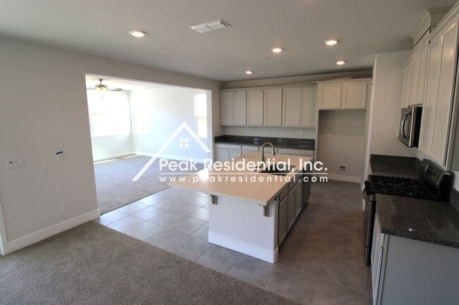 Building Photo - 4 br, 3 bath House - 8200 Triplefin Way