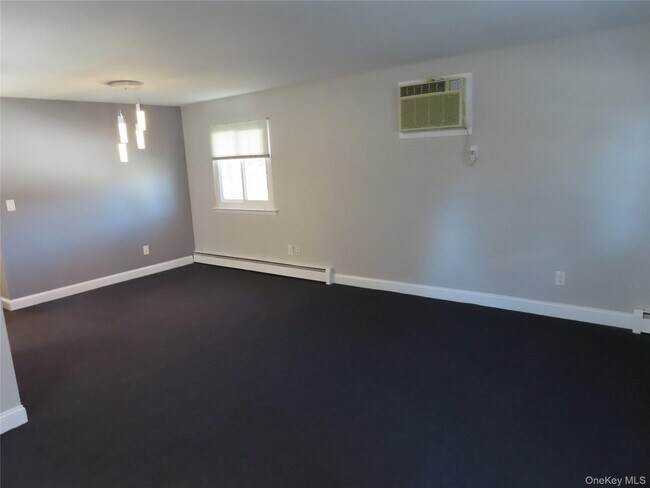 Building Photo - 1210 Smithtown Ave