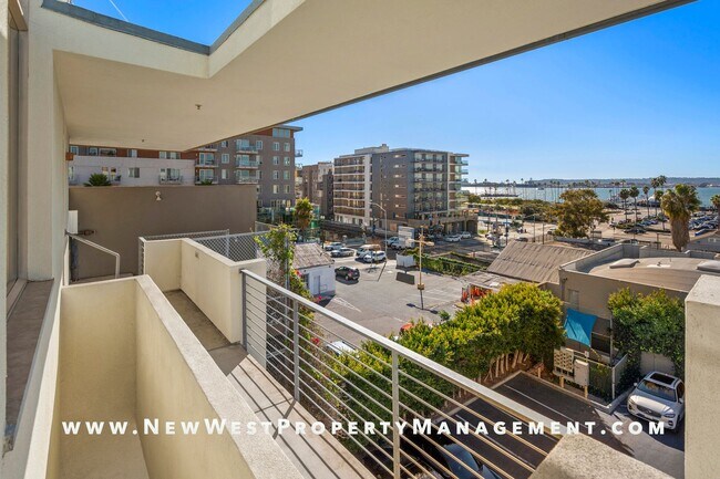 Building Photo - Views, Views, Views! Stunning Top-Floor Little Italy 2-bedroom Loft at The Waterfront!