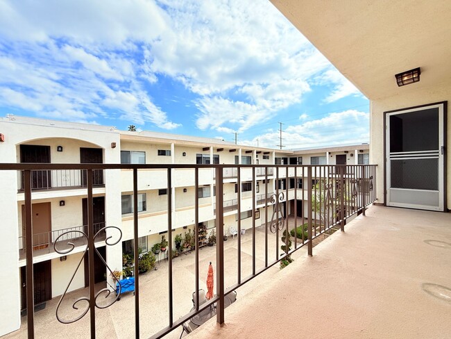 Building Photo - Stylish & Spacious 2-Bedroom Condo for Ren...