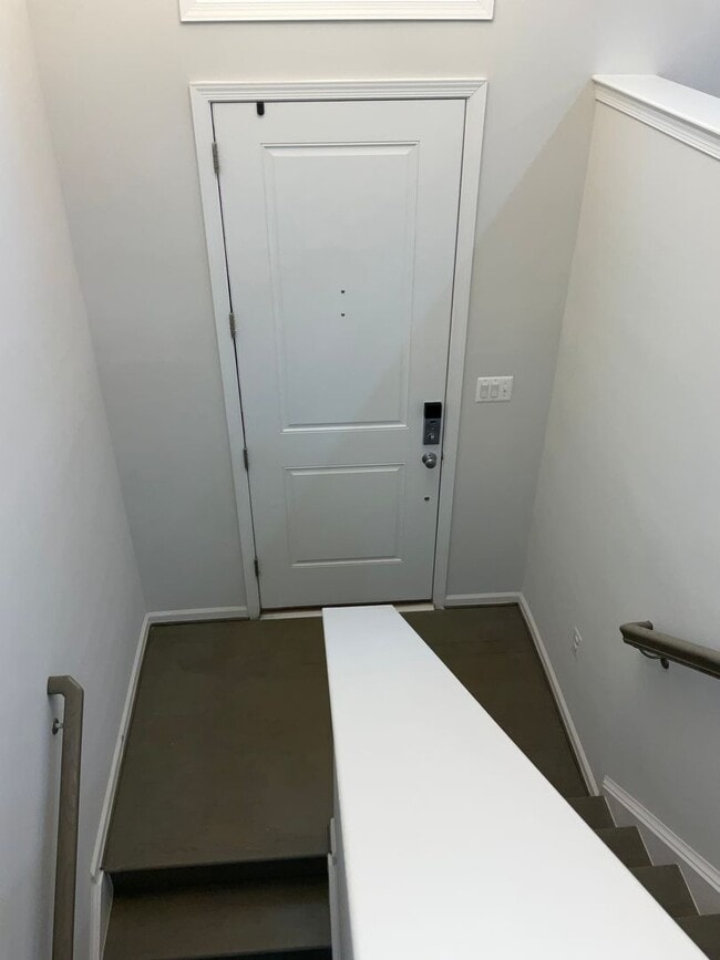 Building Photo - Beautiful 4BR 3.5BA 3 level townhome with 2 car attached garage located in the Cabin Branch Commu...