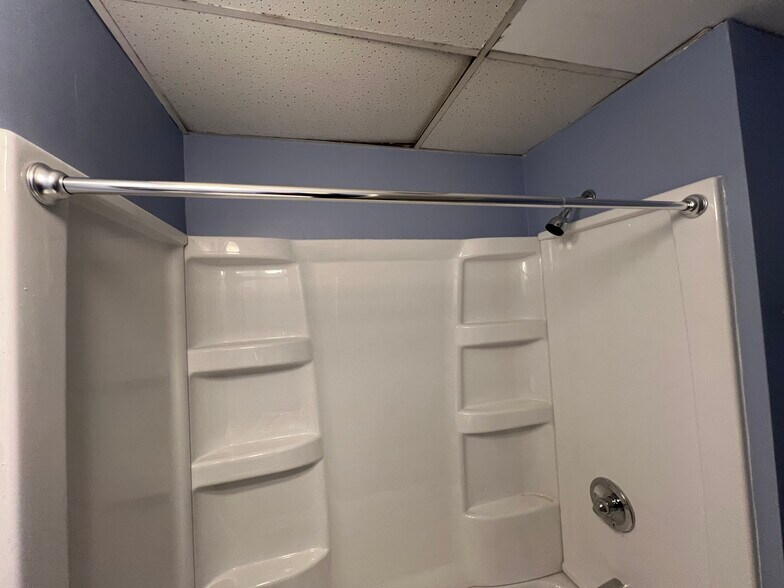 Completely renovated bathroom, new tub, new surround, vanity, and flooring - 18243 Sloane Ave