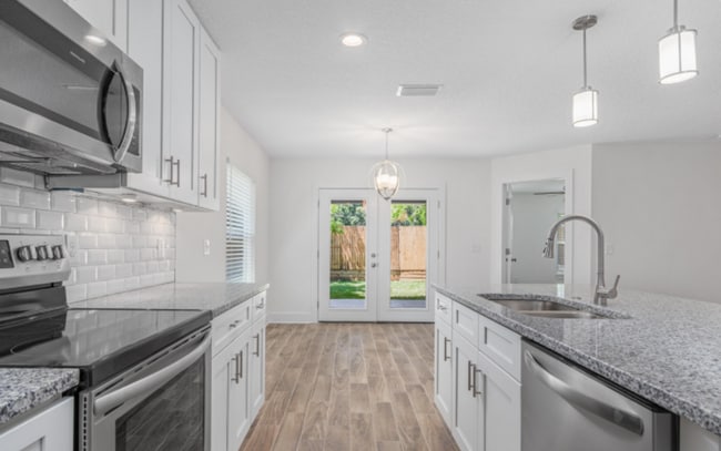 Building Photo - A beautiful 4 bedroom, 2 bathroom property...