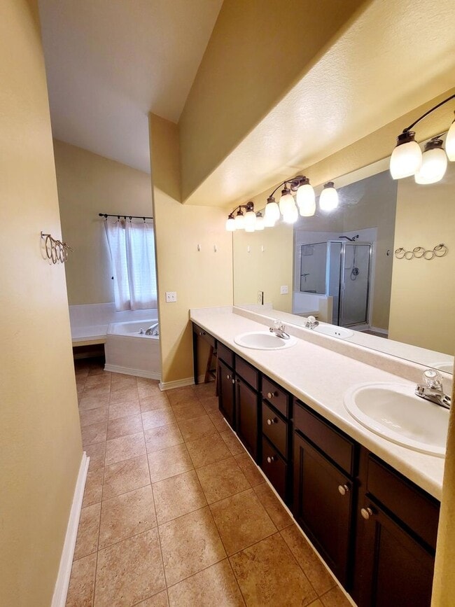 Building Photo - Boastful 3 Bedroom West Side home in gated...