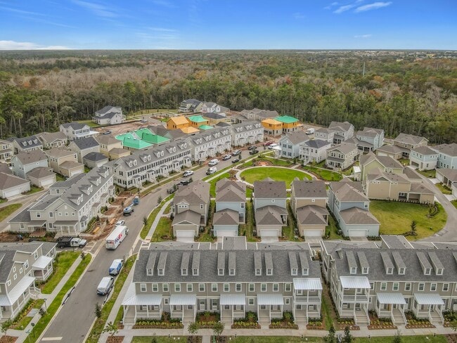 Building Photo - New Luxury Townhome in Celebration, FL Corner unit.  All porcelain tiled floors.  Aleutian model ...