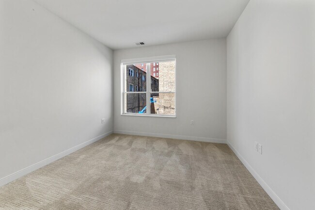 Building Photo - 5945 6th Ave