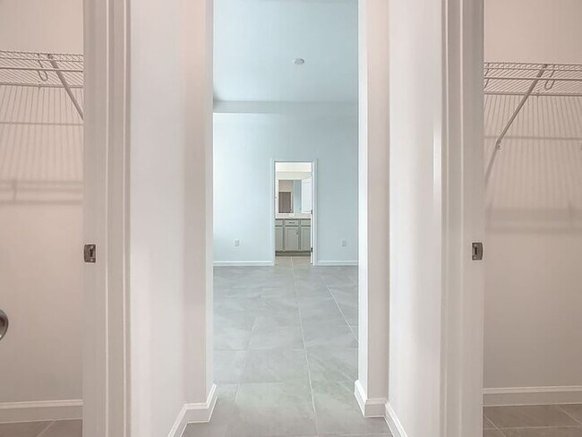 Building Photo - New Luxury Townhome in Celebration with All porcelain tiled floors. Island Village new construction