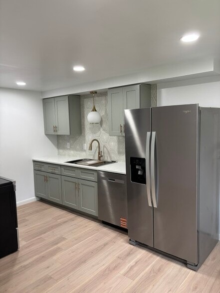 Kitchen w/new dishwasher and refrigerator - 16 Brittany Dr