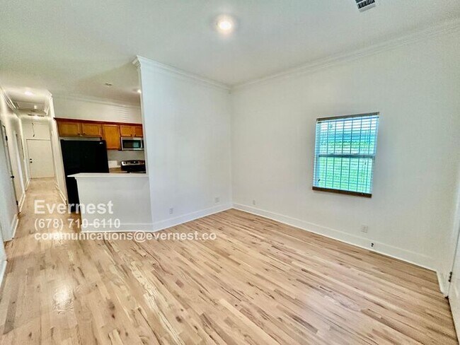 Building Photo - Spacious 4-Bedroom Home with Front Porch a...