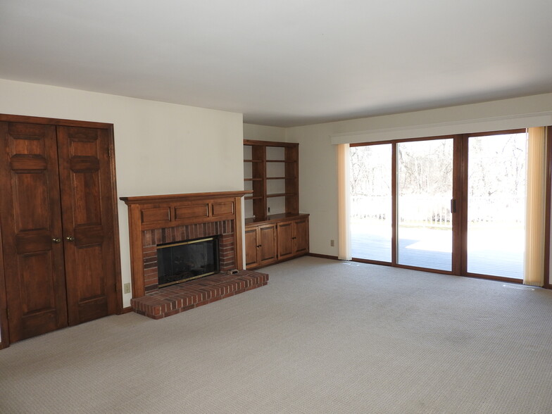 Living room with gas fireplace - 1720 W Bradford Dr