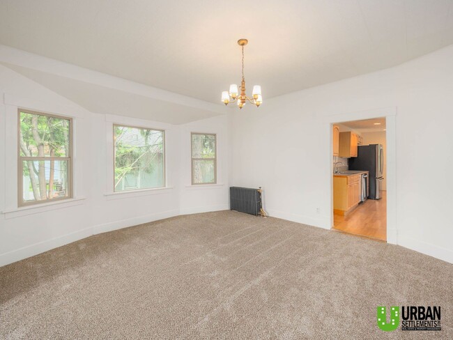 Building Photo - Spacious 4-Bedroom Home with 2-Car Garage, Basement Storage & Flexible Living Space in North Spokane
