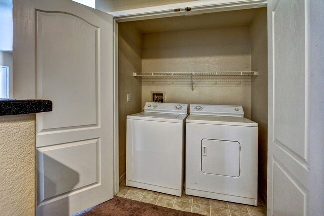 Building Photo - FANTASTIC HIGHLY UPGRADED UNIT FACING THE PARK AND POOL.