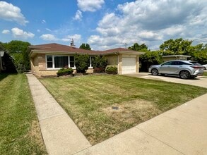 Building Photo - 7150 N Crawford Ave