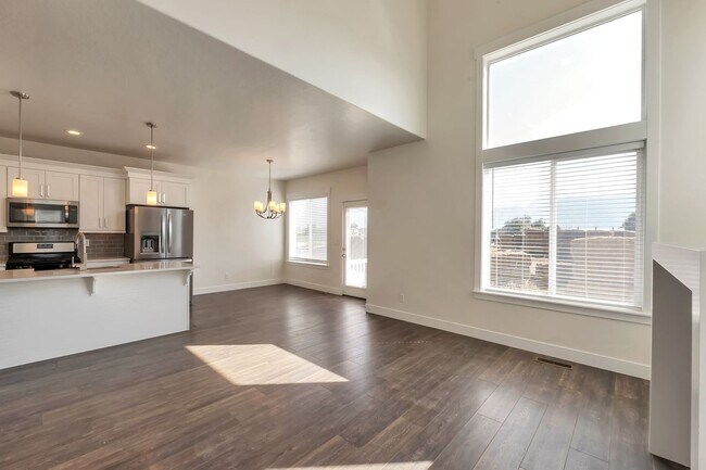 Building Photo - Modern Row End Townhome w 2 car attached g...