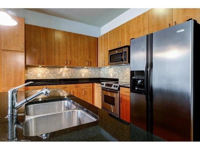 Building Photo - 711 Cosmopolitan Dr NE