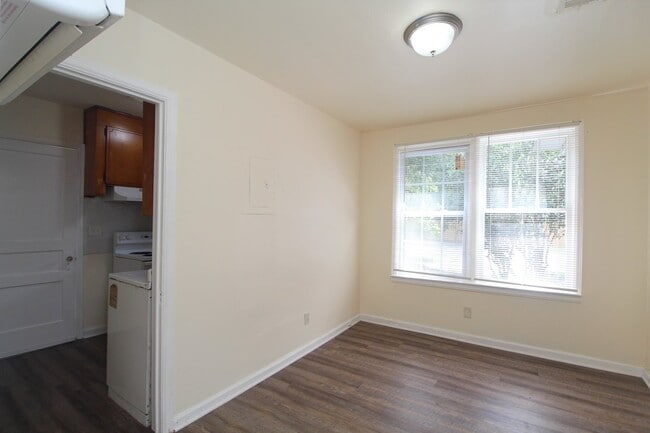 Building Photo - 2BR Cottage Home with LVP Flooring Throughout, Bonus Sunroom, Covered Parking & Low-Maintenance L...