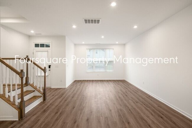 Building Photo - Spacious 3-Bed / 2.5-Bath Townhome with First-Floor Den, Hardwood Floors & 1-Car Garage – Wendell...
