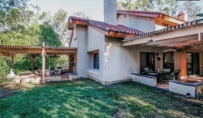 Building Photo - Spacious 5-Bedroom Home for Rent in Prime ...