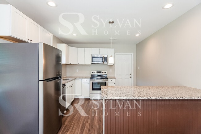 Building Photo - Turn the key. Enter. Smile. Repeat every day!