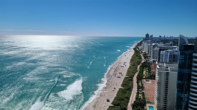 Building Photo - 3 br, 2.5 bath Condo - 6365 Collins Ave On...