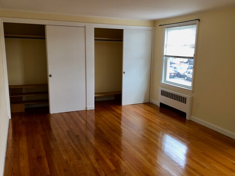 Spacious closets and shoe shelves in primary bedroom - 26 Grove St