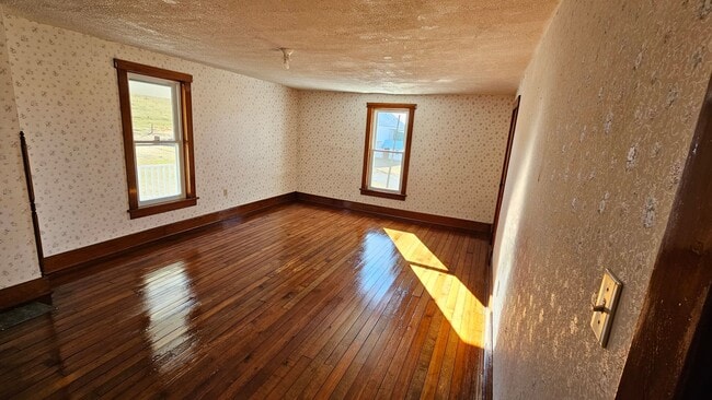 Building Photo - Country Living in This 4 Bedroom Farmhouse!