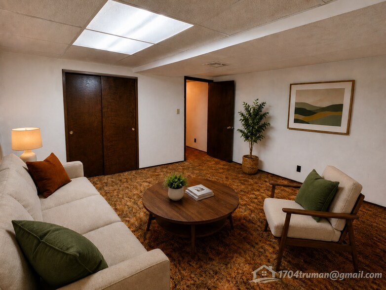 Other view of the larger basement room (AI staged for ideas!) - 1316 Raab Ave