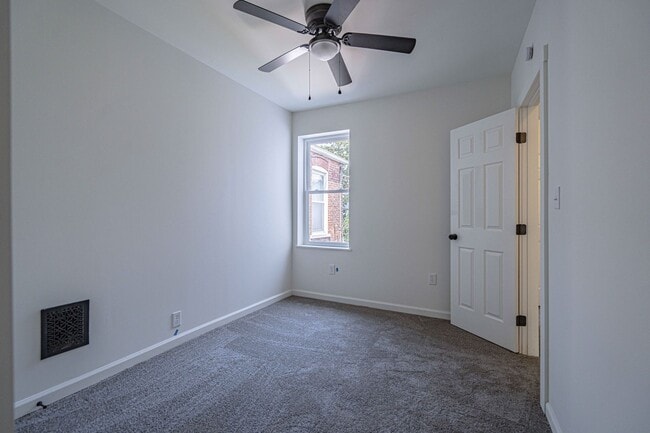 Building Photo - UPDATED FOUR BEDROOM/1.5 BATH TOWNHOME