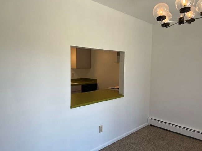 Building Photo - Well-Appointed Apartment Available This August