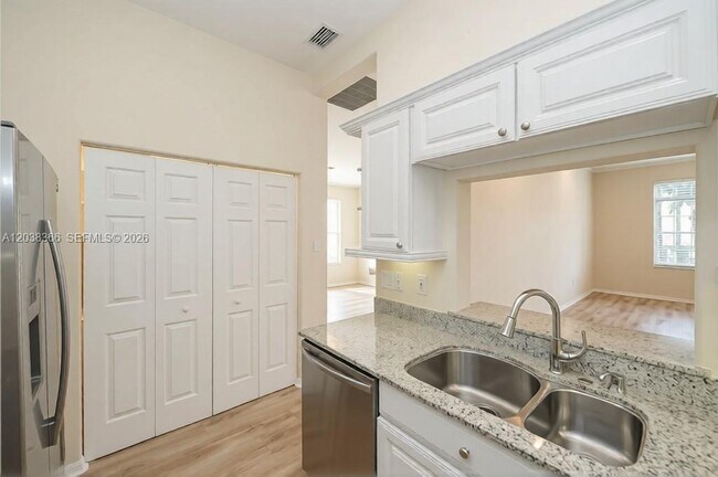 Building Photo - 1301 N Tamiami Trl