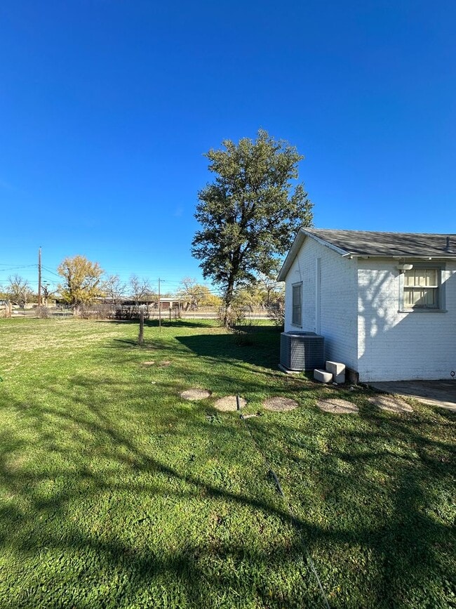 Building Photo - COMING MAY 2026! Charming 4-Bedroom Home + Huge Lot!