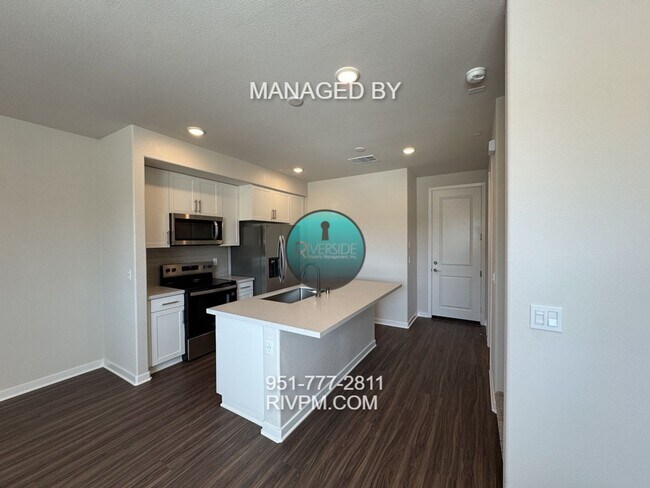 Building Photo - New Build Gem! Modern Three-Bedroom Condo with Bright Open Layout & Private Patio – Available Now!