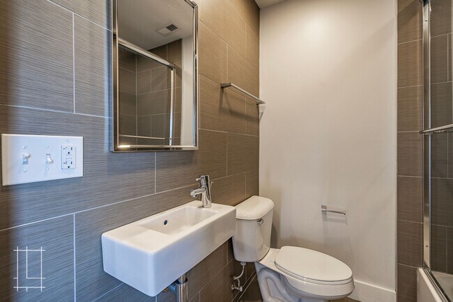 Building Photo - Available Now: One Month Free Rent!