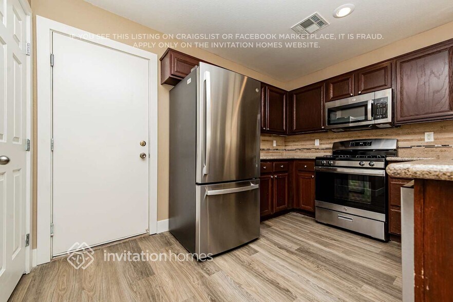 Building Photo - 8433 Walker Gardens Pl