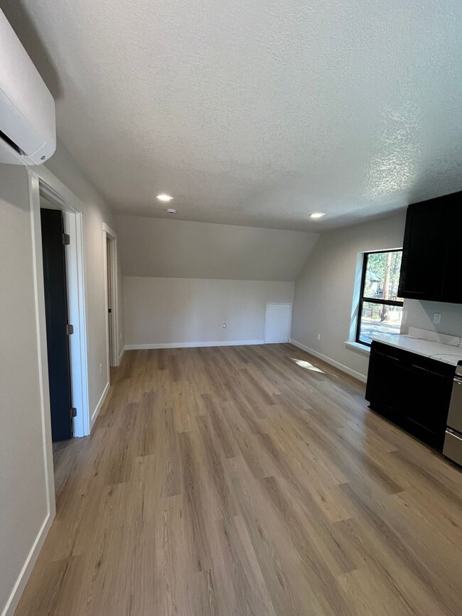 Building Photo - Spectacular BRAND NEW 1-bed/1-bath apartment with Mt Views! ***Utilities included!***