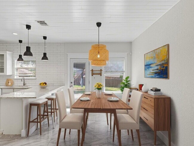 Building Photo - Discover the perfect blend of comfort and space at 6323 Myrtle.