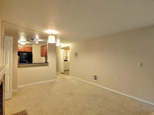 Building Photo - Lovely Condo in the Woods - Deck - Carport - FP - Closets - WD/DW - Fitness Center - Pools