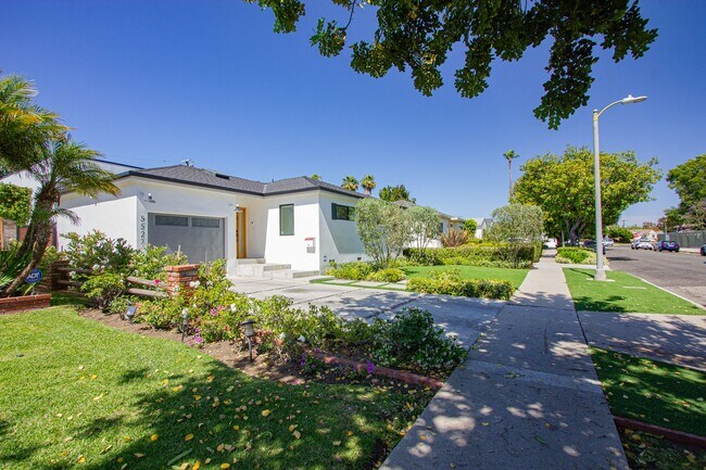 Building Photo - Spacious 4BR/3BA Westchester Home with Private Backyard, BBQ & Security System