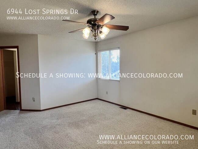 Building Photo - 6944 Lost Springs Dr