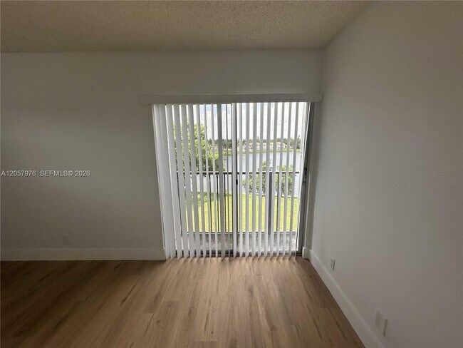 Building Photo - 8560 N Sherman Cir