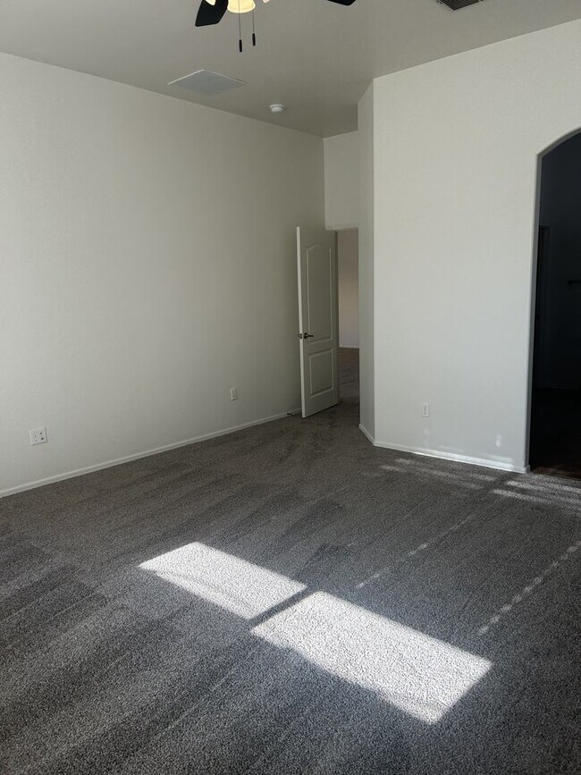 Building Photo - Unfurnished four bedroom large home!  Three car garage