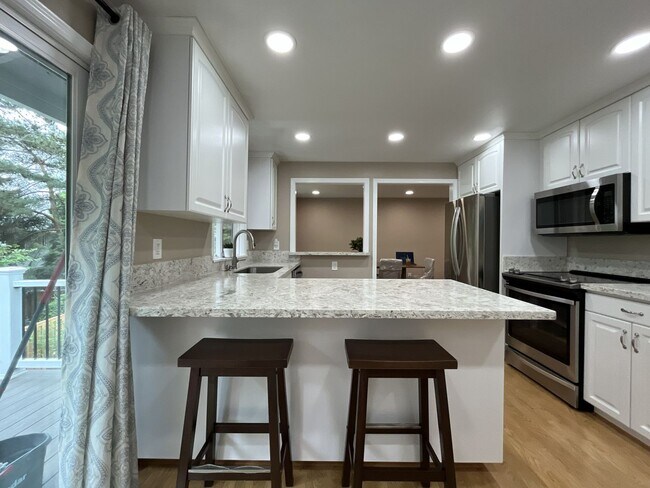 Building Photo - Three-Bedroom Home Near Nike Campus with Bonus Room, Large Deck & Two-Car Garage