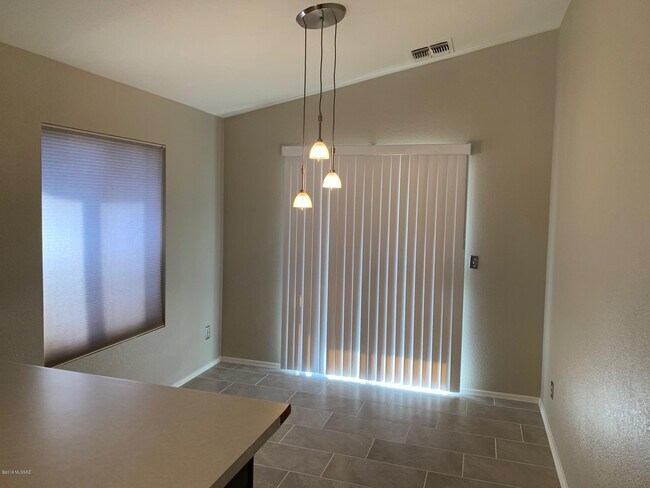 Building Photo - 8824 S Desert Rainbow Dr